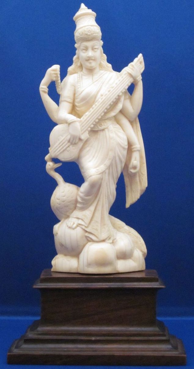 Indian Carved Ivory Figure of 4-Armed Saraswati & Peacock, c1900 Indian Carved Ivory Figure of 4-Armed Saraswati & Peacock, c1900