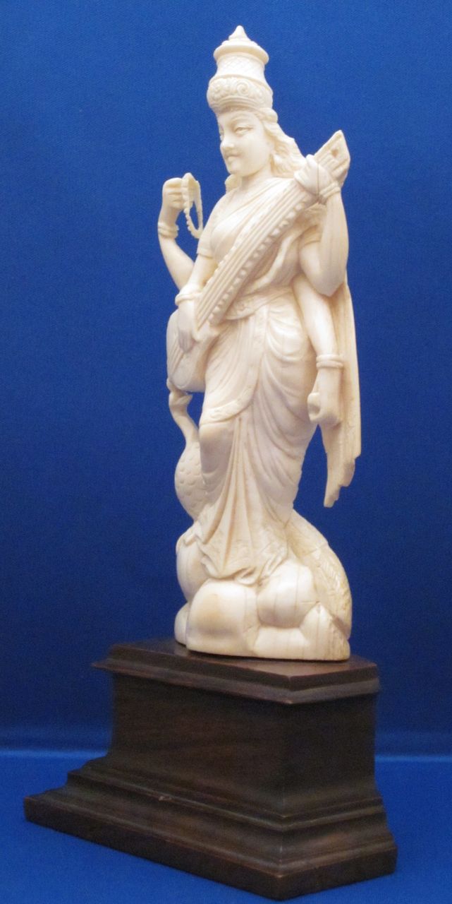 Indian Carved Ivory Figure of 4-Armed Saraswati & Peacock, c1900 Indian Carved Ivory Figure of 4-Armed Saraswati & Peacock, c1900