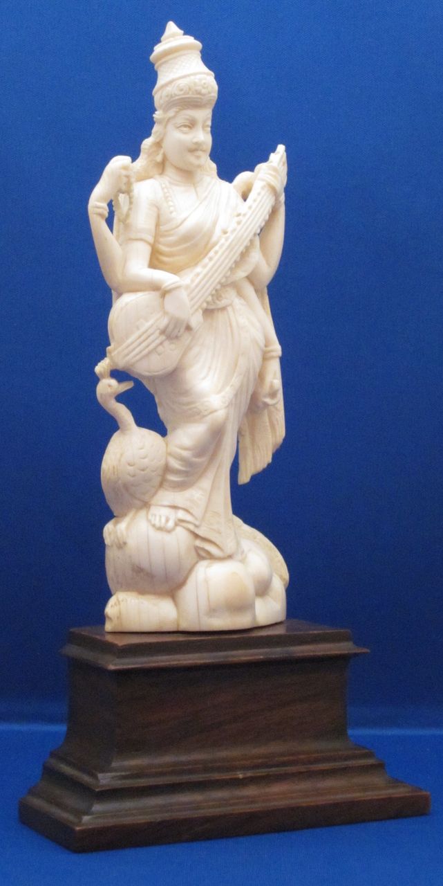 Indian Carved Ivory Figure of 4-Armed Saraswati & Peacock, c1900 Indian Carved Ivory Figure of 4-Armed Saraswati & Peacock, c1900