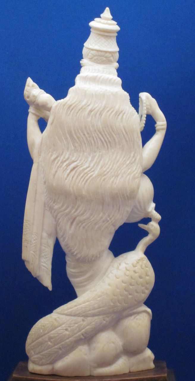 Indian Carved Ivory Figure of 4-Armed Saraswati & Peacock, c1900 Indian Carved Ivory Figure of 4-Armed Saraswati & Peacock, c1900