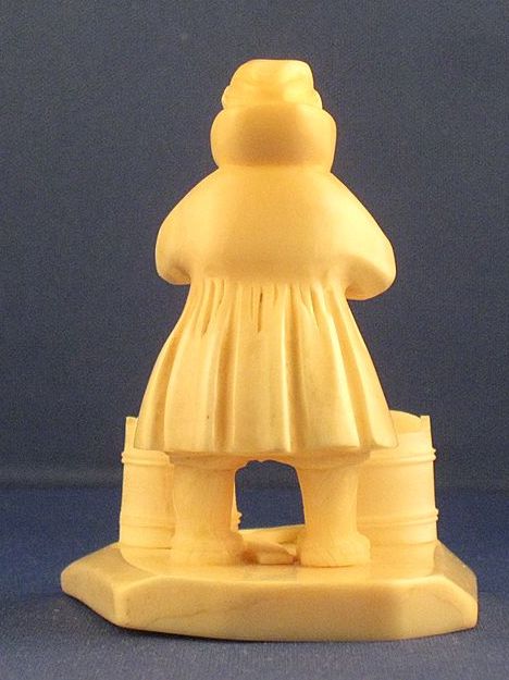 Inuit Carved Ivory Woman with Fish and Buckets - FINE DETAIL Inuit Carved Ivory Woman with Fish and Buckets - FINE DETAIL