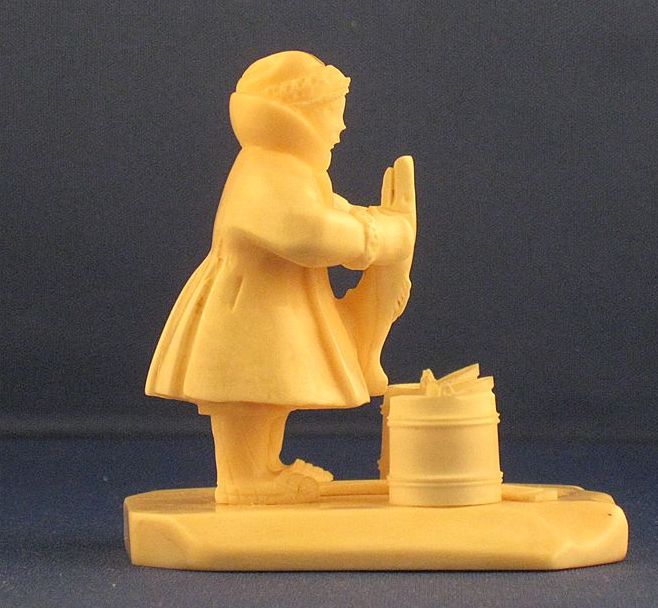 Inuit Carved Ivory Woman with Fish and Buckets - FINE DETAIL Inuit Carved Ivory Woman with Fish and Buckets - FINE DETAIL