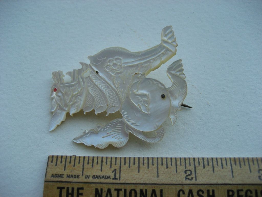 Antique Chinese Carved Mother of Pearl Fu Dog Brooch Antique Chinese Carved Mother of Pearl Fu Dog Brooch