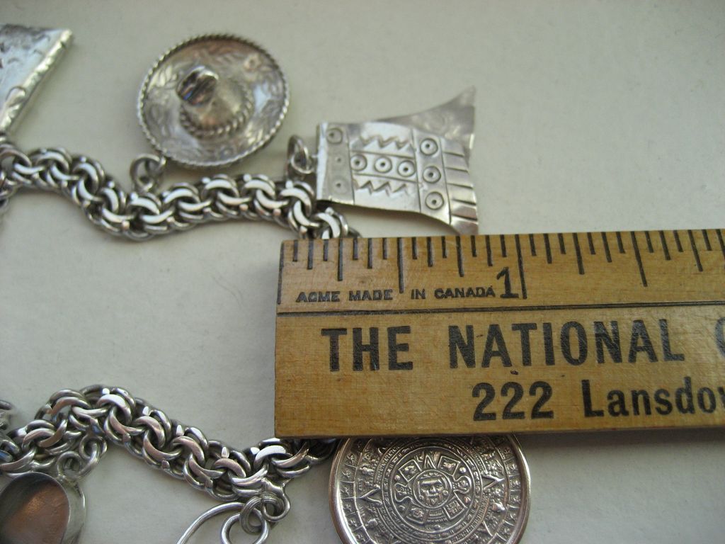 Vintage Mid Century Mexican Sterling Hand Made Charm Bracelet Vintage Mid Century Mexican Sterling Hand Made Charm Bracelet