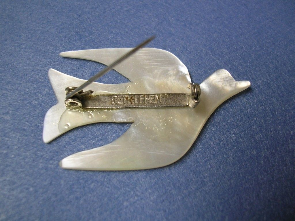 Bethlehem Hand Carved Mother-of-Pearl Dove Pin Bethlehem Hand Carved Mother-of-Pearl Dove Pin