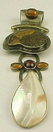 Designer Signed Boma Ammonite, Mother Of Pearl,Amber & Garnet Pendant Designer Signed Boma Ammonite, Mother Of Pearl,Amber & Garnet Pendant