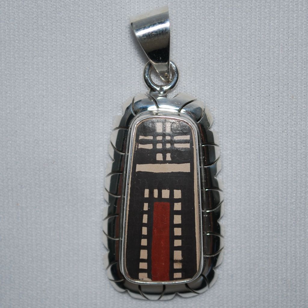 Mata Ortiz pottery shard and sterling silver pendant Mata Ortiz pottery shard and sterling silver pendant