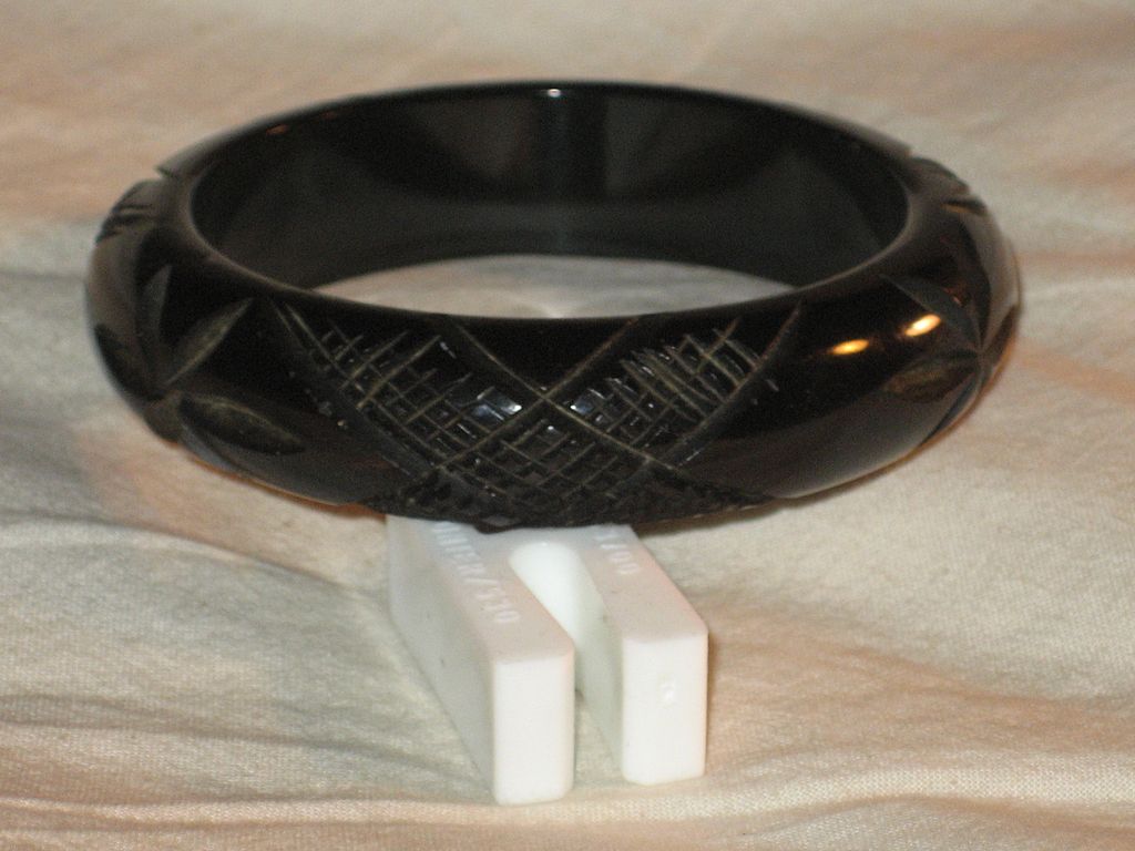 Bakelite Carved Black Intricate Criss-Cross Bangle Bakelite Carved Black Intricate Criss-Cross Bangle