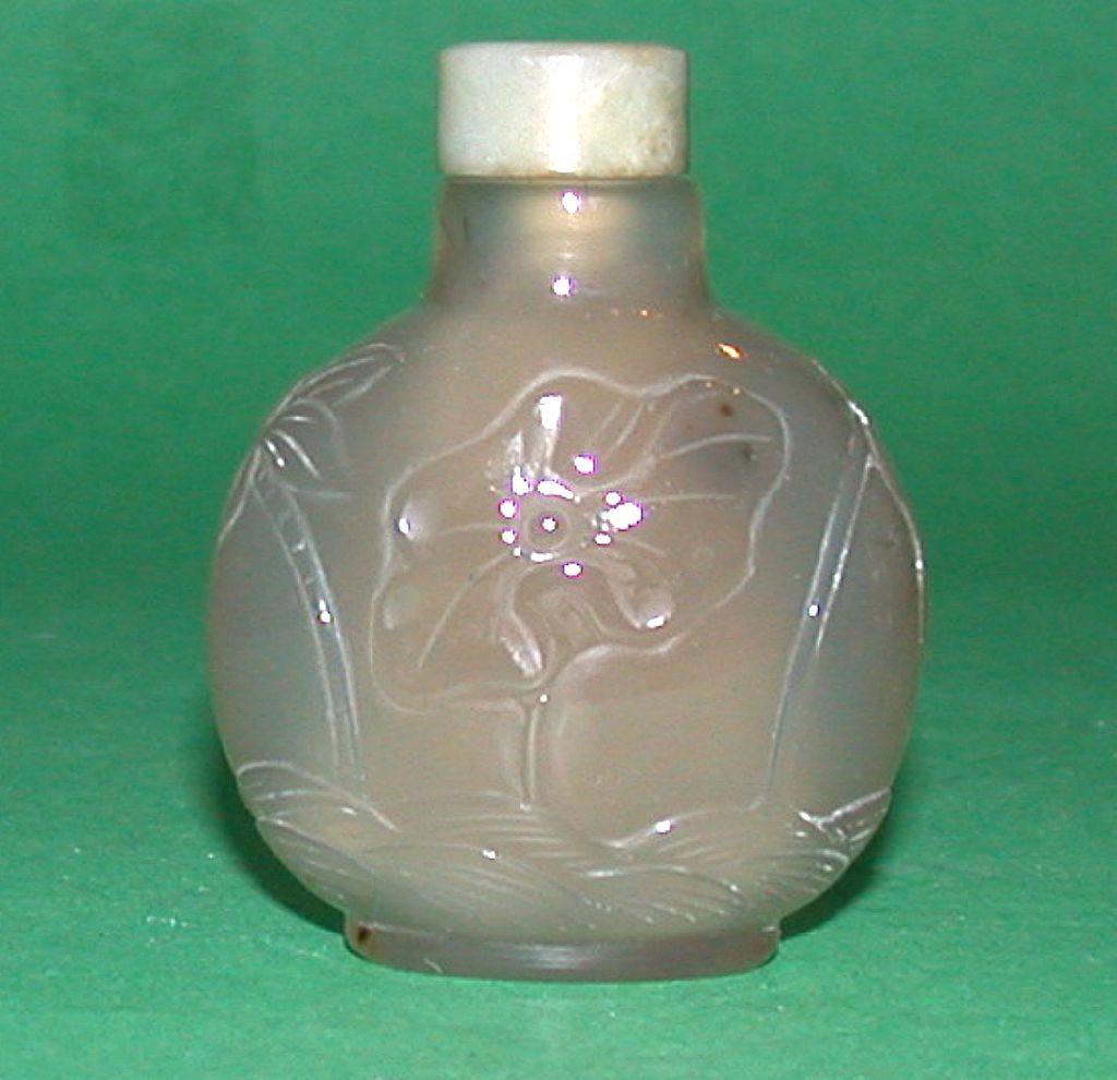 Masterfully Carved Antique Chalcedony Snuff Bottle, c between 1820 and 1880 Masterfully Carved Antique Chalcedony Snuff Bottle, c between 1820 and 1880
