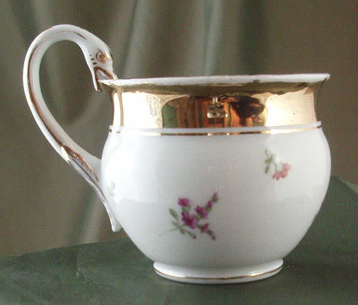 Meissen Floral-Decorated Coffee Cup with Swan Handle Meissen Floral-Decorated Coffee Cup with Swan Handle