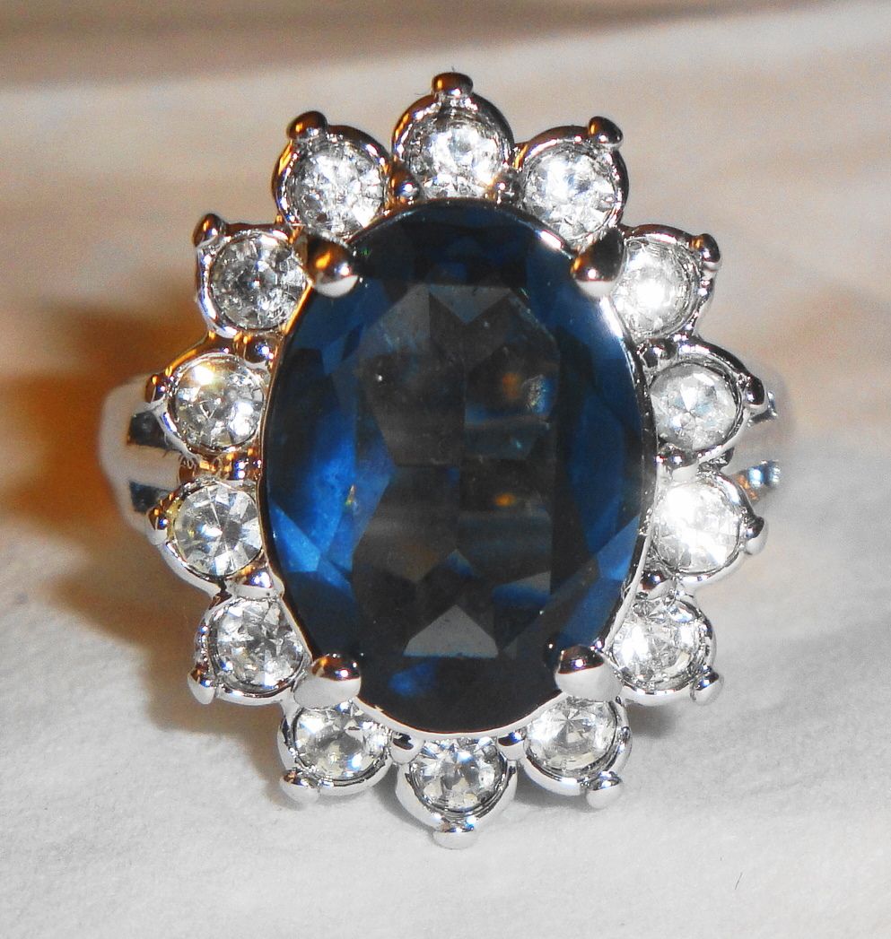 Vintage Avon 1987 "Regal Style Ring" ~ Size 8 ~ faux sapphire surrounded by crystals set in silver-tone Vintage Avon 1987 "Regal Style Ring" ~ Size 8 ~ faux sapphire surrounded by crystals set in silver-tone