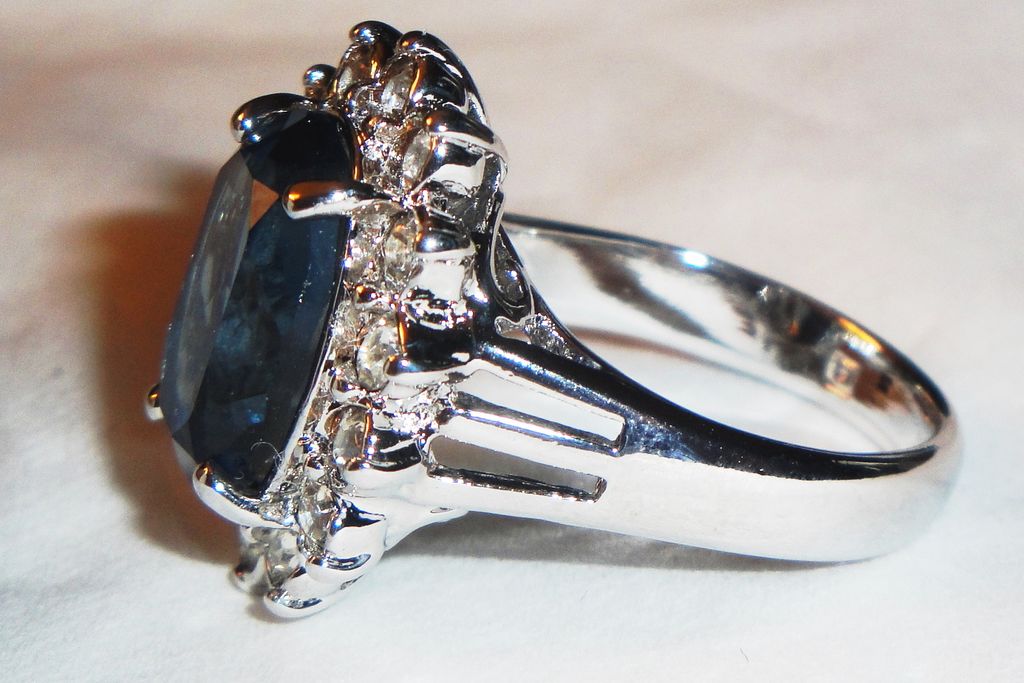 Vintage Avon 1987 "Regal Style Ring" ~ Size 8 ~ faux sapphire surrounded by crystals set in silver-tone Vintage Avon 1987 "Regal Style Ring" ~ Size 8 ~ faux sapphire surrounded by crystals set in silver-tone