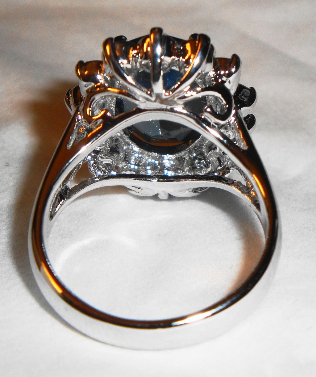 Vintage Avon 1987 "Regal Style Ring" ~ Size 8 ~ faux sapphire surrounded by crystals set in silver-tone Vintage Avon 1987 "Regal Style Ring" ~ Size 8 ~ faux sapphire surrounded by crystals set in silver-tone