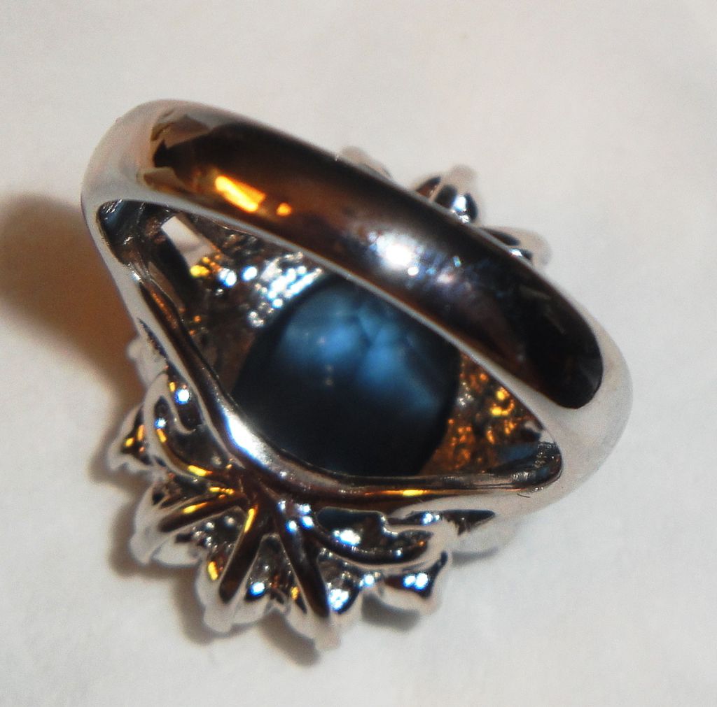 Vintage Avon 1987 "Regal Style Ring" ~ Size 8 ~ faux sapphire surrounded by crystals set in silver-tone Vintage Avon 1987 "Regal Style Ring" ~ Size 8 ~ faux sapphire surrounded by crystals set in silver-tone