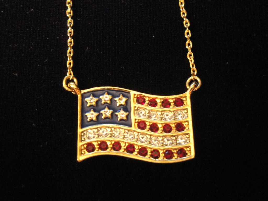 Vintage Signed Avon American Flag ~ gold-tone ~ garnet colored rhinestones for red strips ~ clear rhinestones for stars & white stripes Vintage Signed Avon American Flag ~ gold-tone ~ garnet colored rhinestones for red strips ~ clear rhinestones for stars & white stripes