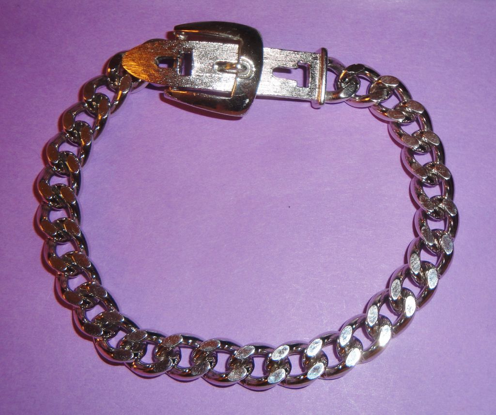 Vintage Signed Avon 1974 Silver-tone "Buckle Chain Bracelet" ~ silver-tone flat-looped links with belt buckle closure Vintage Signed Avon 1974 Silver-tone "Buckle Chain Bracelet" ~ silver-tone flat-looped links with belt buckle closure