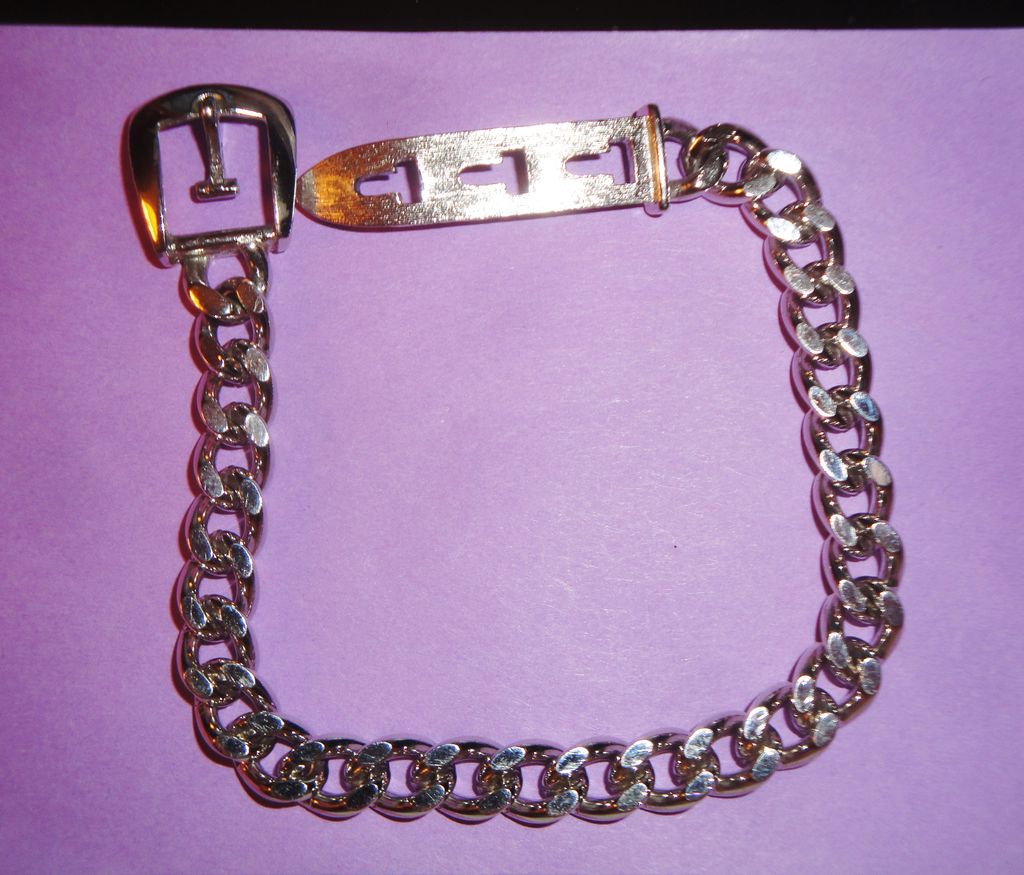 Vintage Signed Avon 1974 Silver-tone "Buckle Chain Bracelet" ~ silver-tone flat-looped links with belt buckle closure Vintage Signed Avon 1974 Silver-tone "Buckle Chain Bracelet" ~ silver-tone flat-looped links with belt buckle closure
