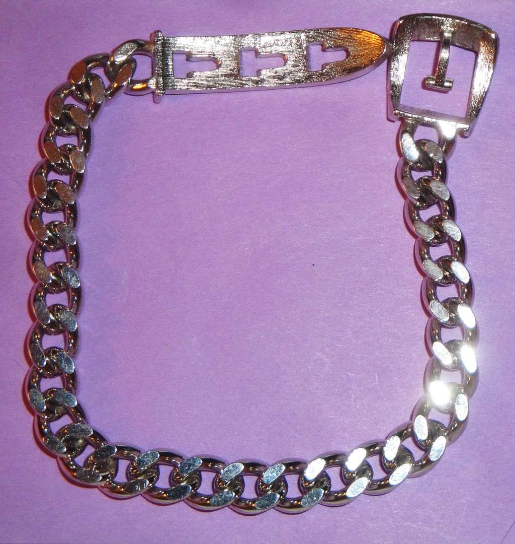 Vintage Signed Avon 1974 Silver-tone "Buckle Chain Bracelet" ~ silver-tone flat-looped links with belt buckle closure Vintage Signed Avon 1974 Silver-tone "Buckle Chain Bracelet" ~ silver-tone flat-looped links with belt buckle closure