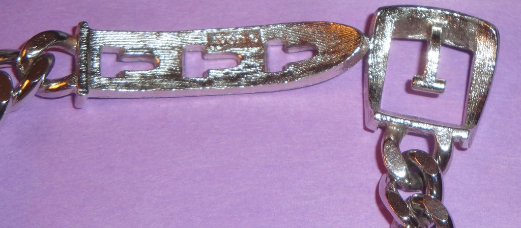 Vintage Signed Avon 1974 Silver-tone "Buckle Chain Bracelet" ~ silver-tone flat-looped links with belt buckle closure Vintage Signed Avon 1974 Silver-tone "Buckle Chain Bracelet" ~ silver-tone flat-looped links with belt buckle closure