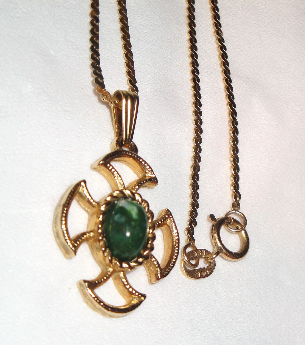 Vintage Avon "Baroness Collection" Necklace with simulated Jade cabochons in gold-tone flower design Vintage Avon "Baroness Collection" Necklace with simulated Jade cabochons in gold-tone flower design