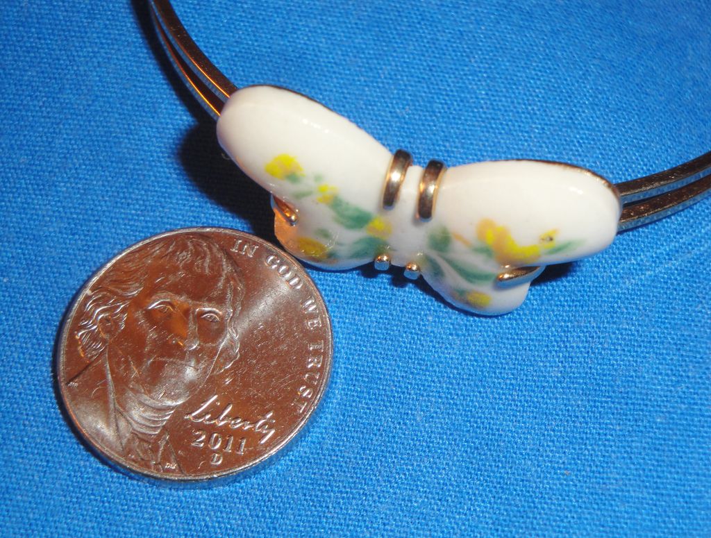 Vintage Signed Avon 1978 "Burst of Spring Bracelet" ~ Size Small~ white porcelain with butterfly decal set in gold-tone Vintage Signed Avon 1978 "Burst of Spring Bracelet" ~ Size Small~ white porcelain with butterfly decal set in gold-tone