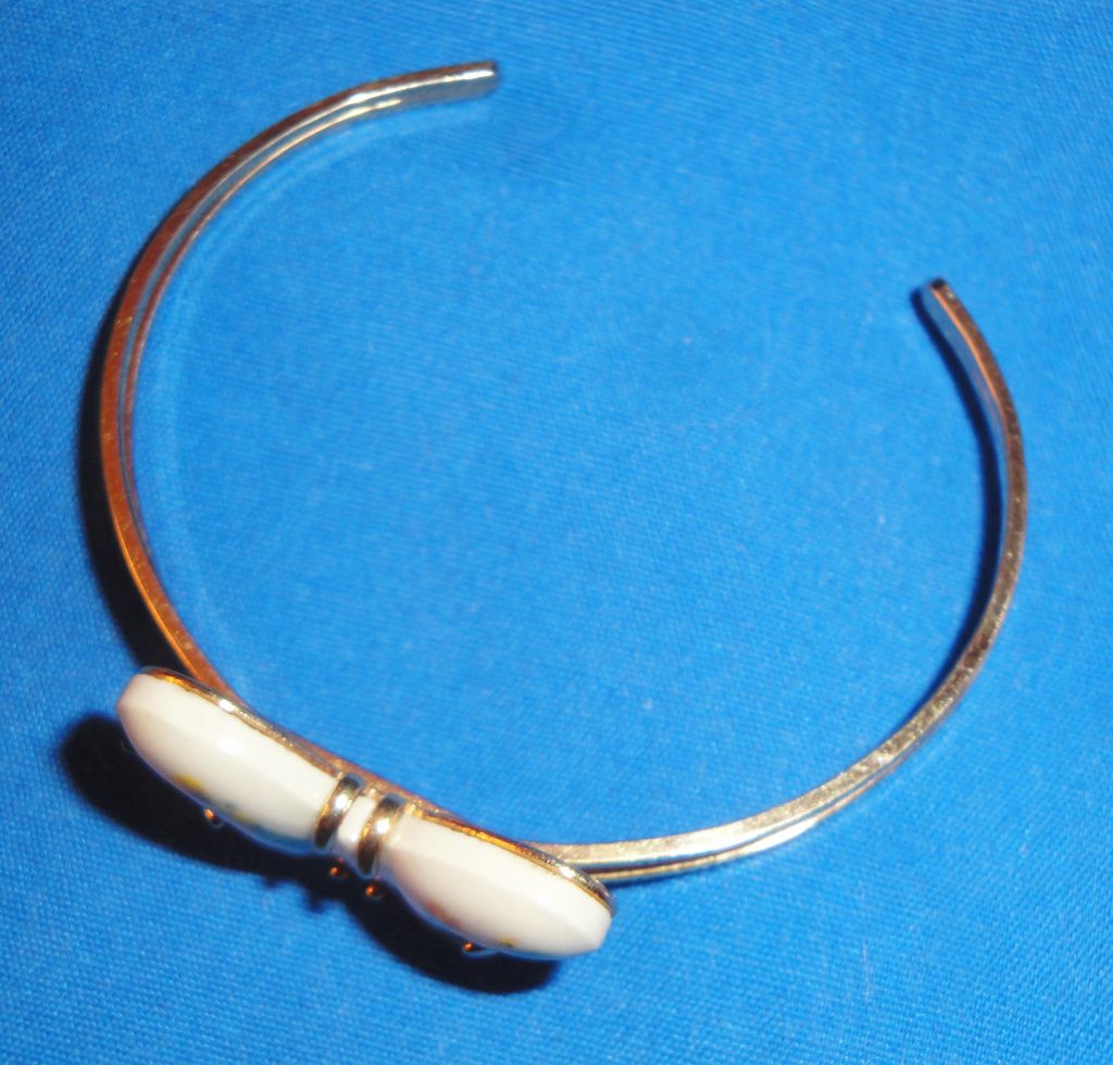 Vintage Signed Avon 1978 "Burst of Spring Bracelet" ~ Size Small~ white porcelain with butterfly decal set in gold-tone Vintage Signed Avon 1978 "Burst of Spring Bracelet" ~ Size Small~ white porcelain with butterfly decal set in gold-tone