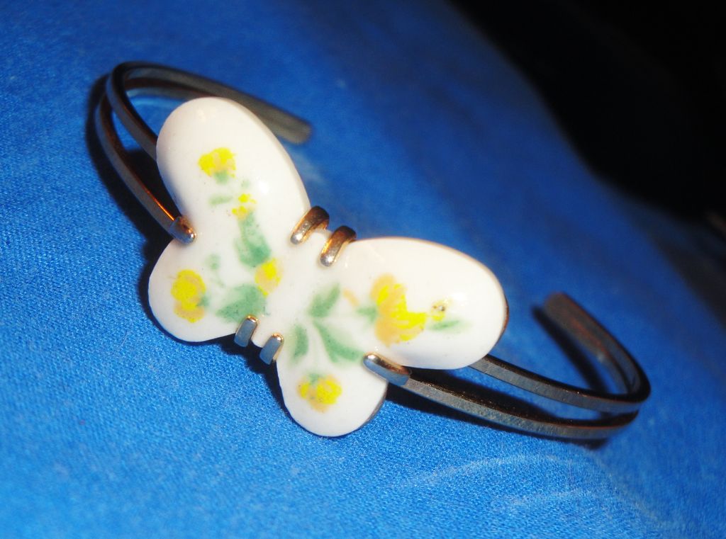 Vintage Signed Avon 1978 "Burst of Spring Bracelet" ~ Size Small~ white porcelain with butterfly decal set in gold-tone Vintage Signed Avon 1978 "Burst of Spring Bracelet" ~ Size Small~ white porcelain with butterfly decal set in gold-tone