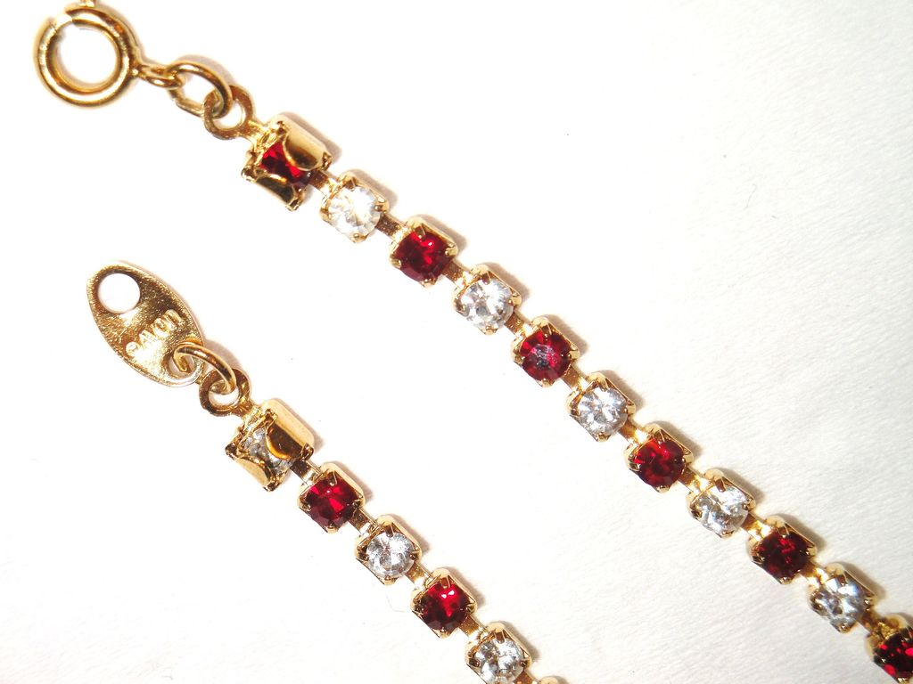 Signed Avon 2003 "Birthstone Tennis Bracelet" for JULY ~ elegant gold-tone tennis bracelet ~ faux ruby & clear rhinestones Signed Avon 2003 "Birthstone Tennis Bracelet" for JULY ~ elegant gold-tone tennis bracelet ~ faux ruby & clear rhinestones
