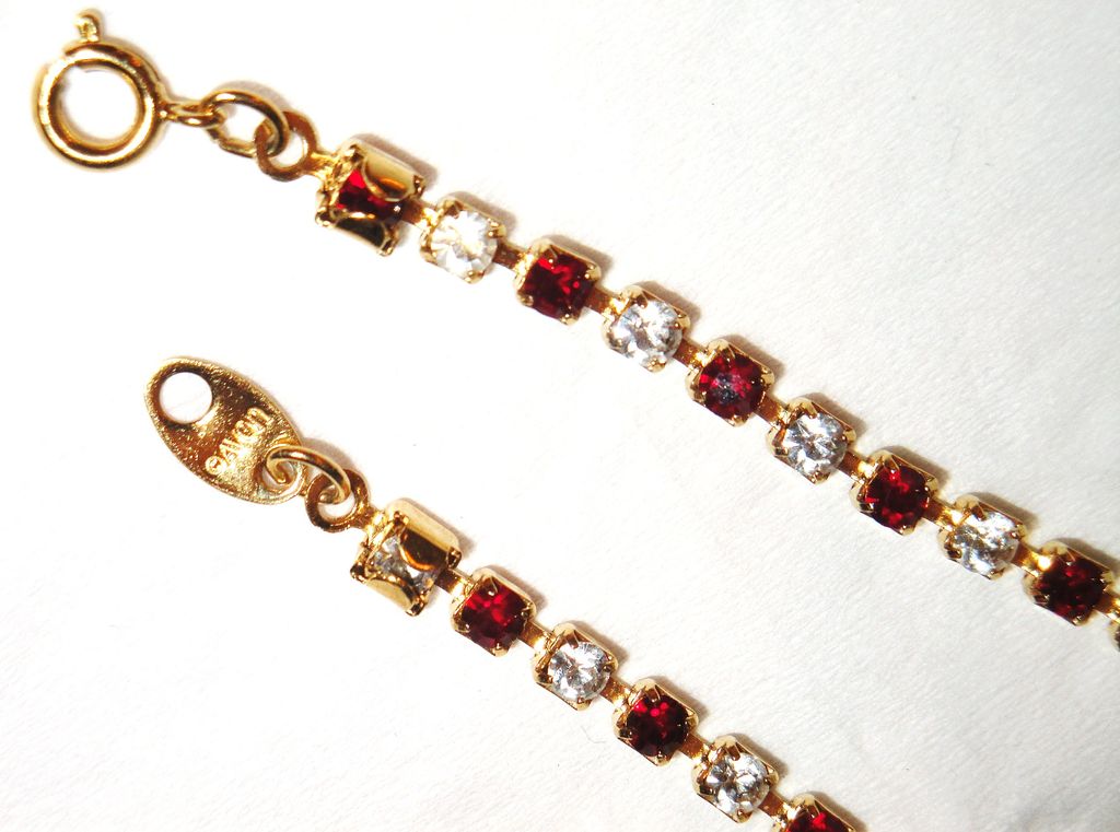 Signed Avon 2003 "Birthstone Tennis Bracelet" for JULY ~ elegant gold-tone tennis bracelet ~ faux ruby & clear rhinestones Signed Avon 2003 "Birthstone Tennis Bracelet" for JULY ~ elegant gold-tone tennis bracelet ~ faux ruby & clear rhinestones