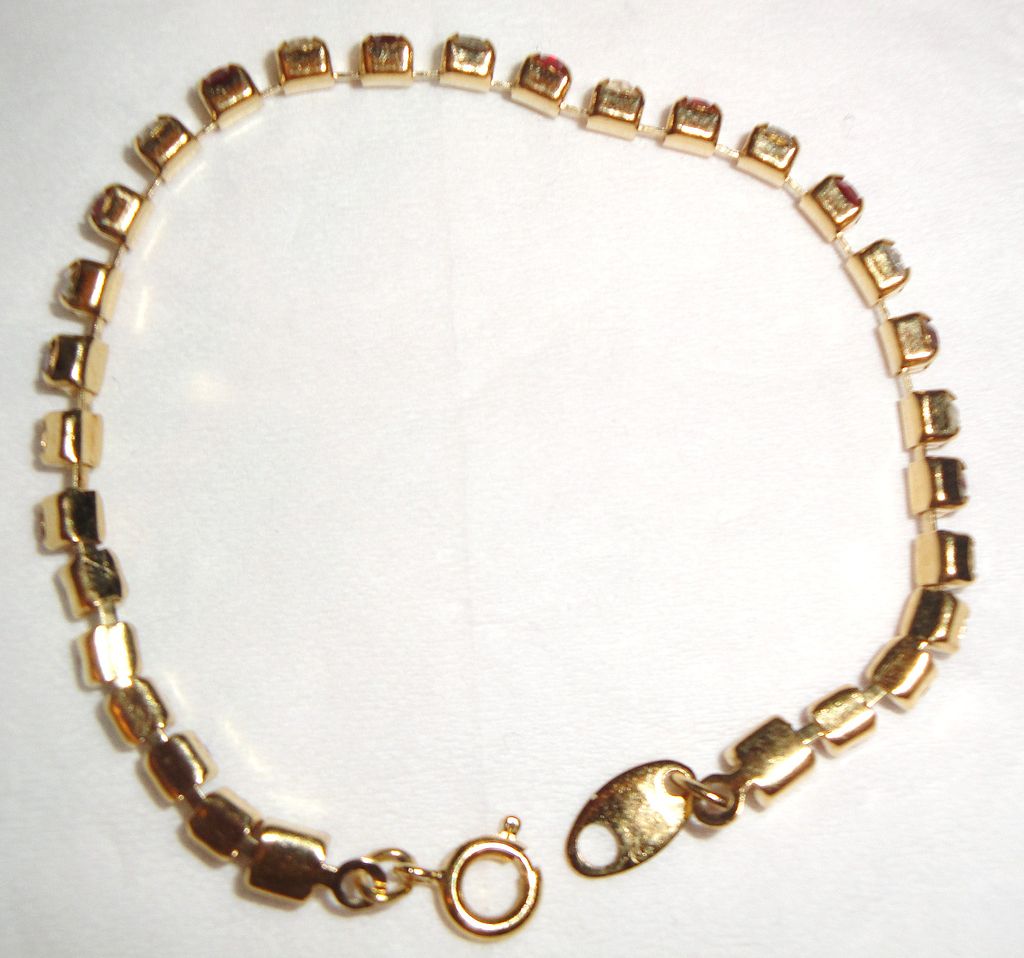 Signed Avon 2003 "Birthstone Tennis Bracelet" for JULY ~ elegant gold-tone tennis bracelet ~ faux ruby & clear rhinestones Signed Avon 2003 "Birthstone Tennis Bracelet" for JULY ~ elegant gold-tone tennis bracelet ~ faux ruby & clear rhinestones