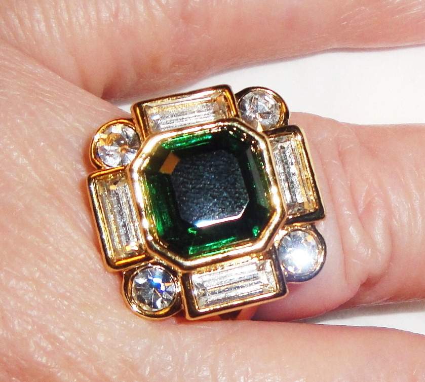Avon Signed "Bold Treasurers" Ring ~ Size 10 ~ large faux emerald surrounded by rhinestones Avon Signed "Bold Treasurers" Ring ~ Size 10 ~ large faux emerald surrounded by rhinestones