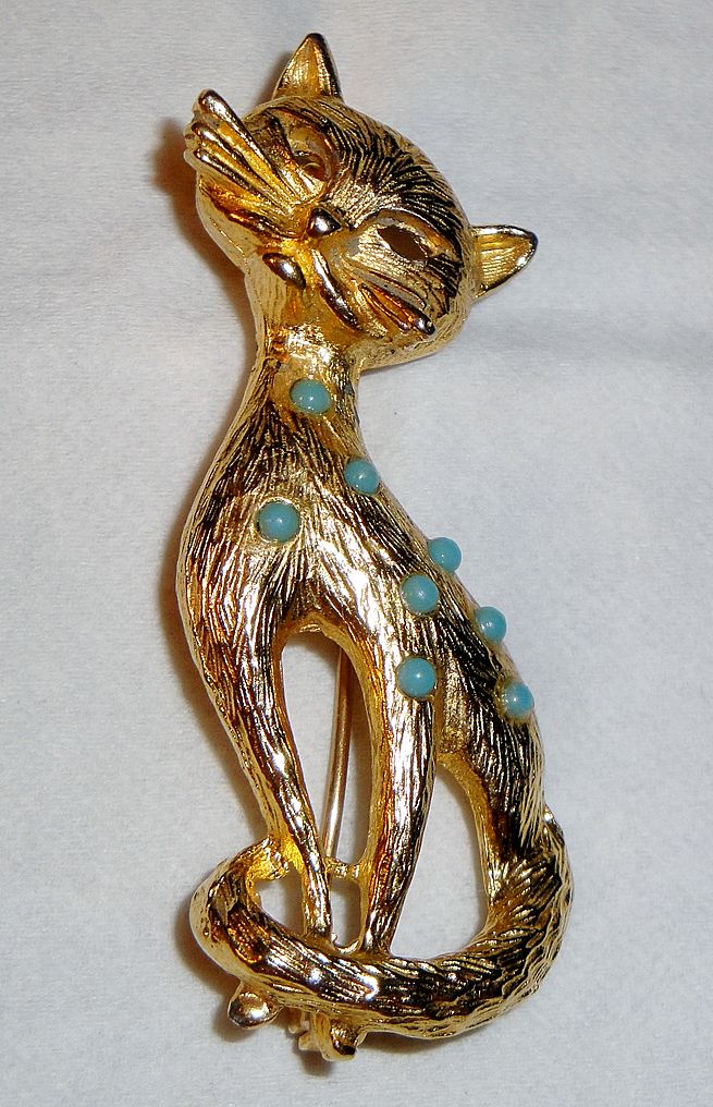 Unique Gold-tone Textured Figural Cat Pin with 8 turquoise stones on back Unique Gold-tone Textured Figural Cat Pin with 8 turquoise stones on back