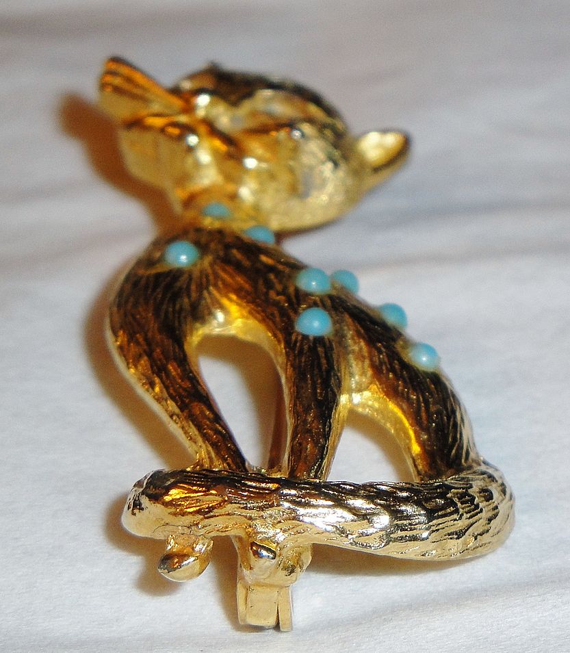 Unique Gold-tone Textured Figural Cat Pin with 8 turquoise stones on back Unique Gold-tone Textured Figural Cat Pin with 8 turquoise stones on back