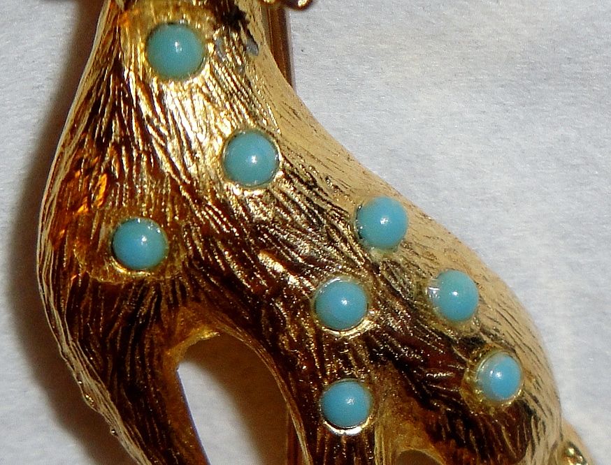 Unique Gold-tone Textured Figural Cat Pin with 8 turquoise stones on back Unique Gold-tone Textured Figural Cat Pin with 8 turquoise stones on back