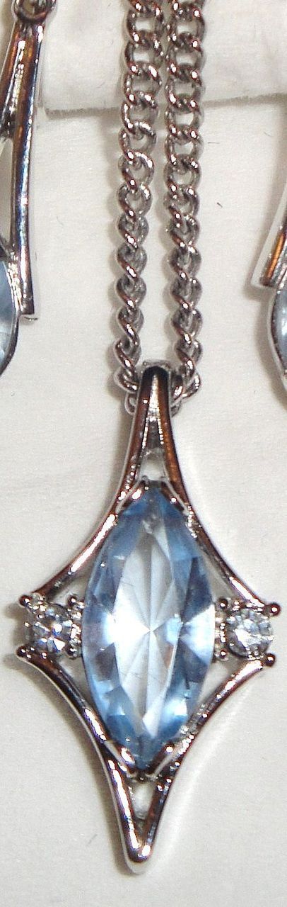 1976 Vintage Signed Avon "Crystal Palace" Collection Necklace ~ large multi-faceted light blue sapphire marquise stone & rhinestones set in silver-tone 1976 Vintage Signed Avon "Crystal Palace" Collection Necklace ~ large multi-faceted light blue sapphire marquise stone & rhinestones set in silver-tone