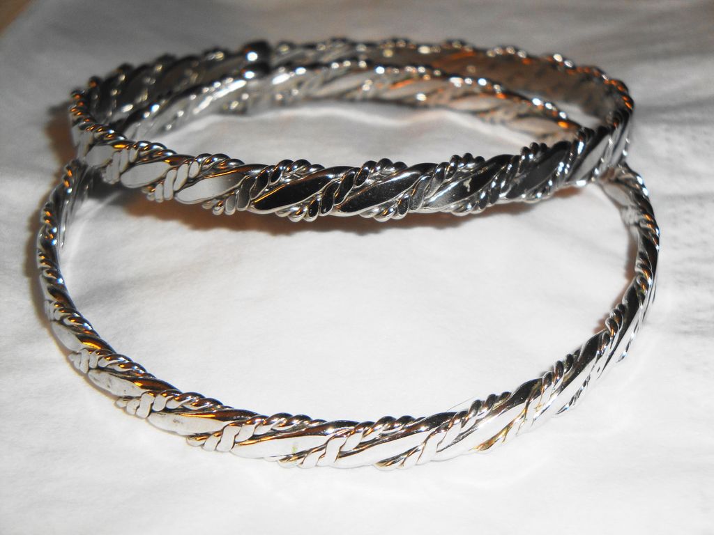TWO ~ Vintage Signed Avon 1979 "Classic Twist Bangle Bracelets" set in Silver-tone TWO ~ Vintage Signed Avon 1979 "Classic Twist Bangle Bracelets" set in Silver-tone
