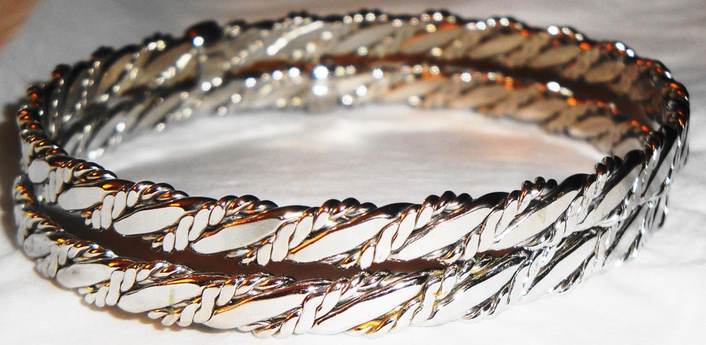 TWO ~ Vintage Signed Avon 1979 "Classic Twist Bangle Bracelets" set in Silver-tone TWO ~ Vintage Signed Avon 1979 "Classic Twist Bangle Bracelets" set in Silver-tone