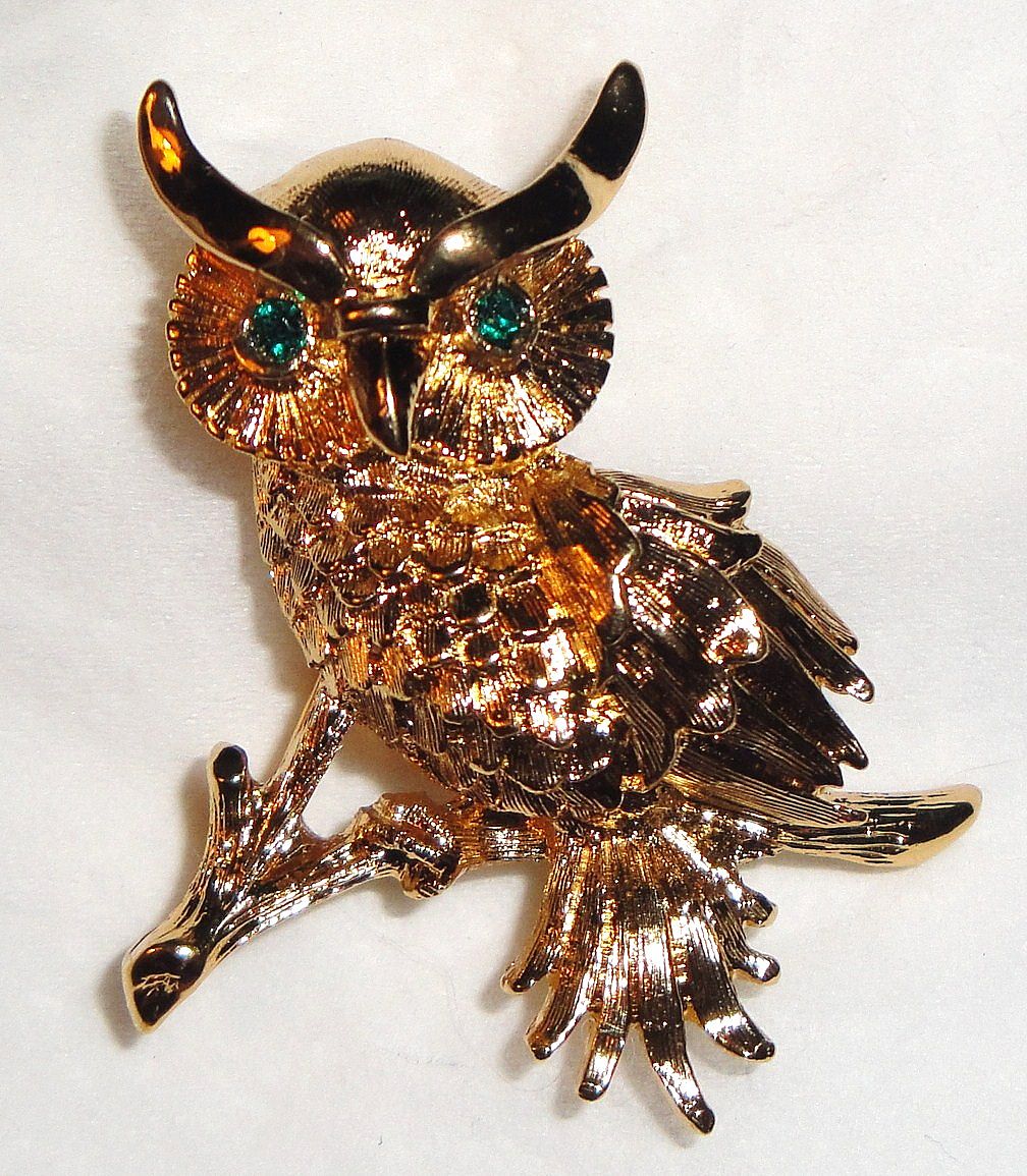 Vintage Signed Monet Gold-tone Owl Sitting on Tree Branch Brooch with Green Rhinestone Eyes Vintage Signed Monet Gold-tone Owl Sitting on Tree Branch Brooch with Green Rhinestone Eyes
