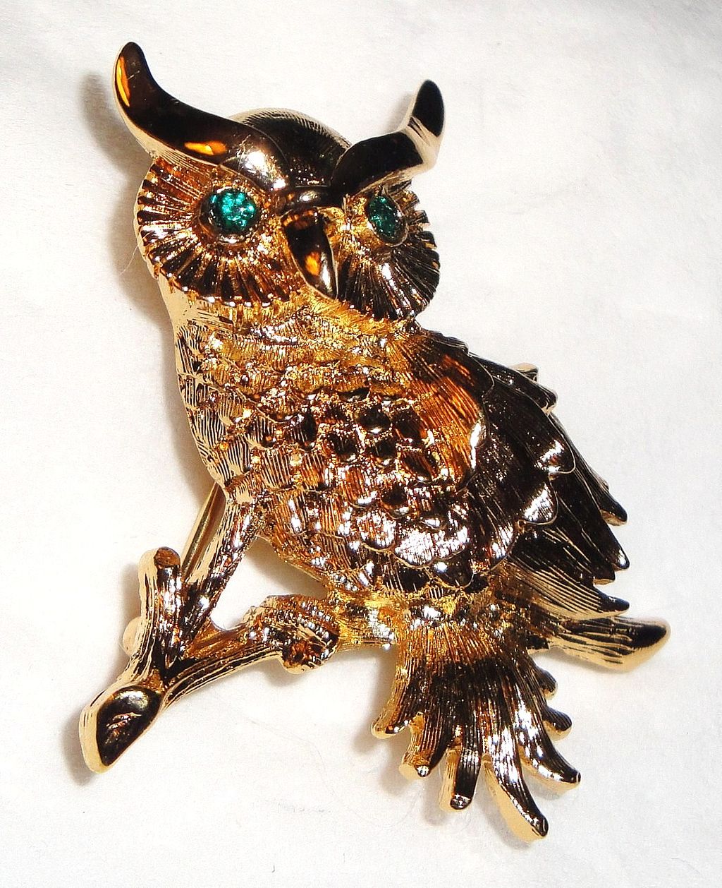 Vintage Signed Monet Gold-tone Owl Sitting on Tree Branch Brooch with Green Rhinestone Eyes Vintage Signed Monet Gold-tone Owl Sitting on Tree Branch Brooch with Green Rhinestone Eyes
