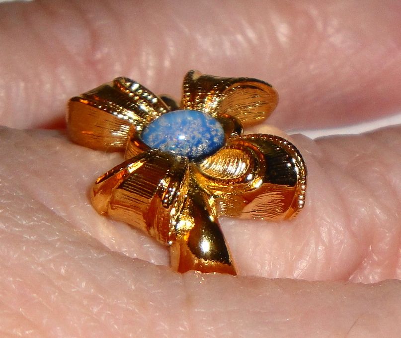 Signed Avon 1994 "Delicate Bow" Ring ~ size 10 ~ faux opal in textured tied bow Signed Avon 1994 "Delicate Bow" Ring ~ size 10 ~ faux opal in textured tied bow