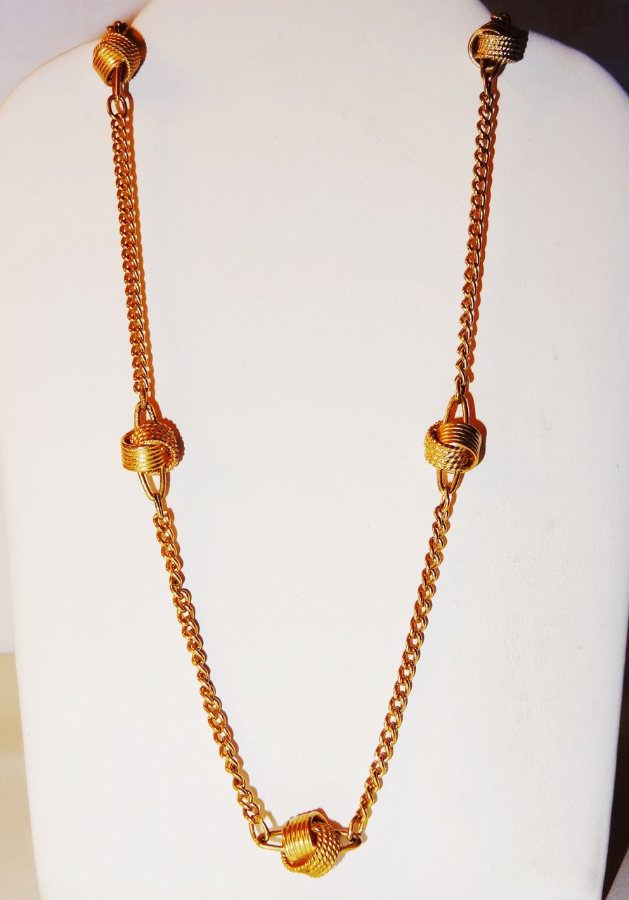 Avon 1977 "Delicate Knot Necklace" ~ 16" set in gold-tone Avon 1977 "Delicate Knot Necklace" ~ 16" set in gold-tone