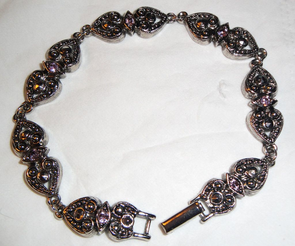 Vintage Signed Avon "Elegant Era" Bracelet ~ faux amethyst stones in marcasite Vintage Signed Avon "Elegant Era" Bracelet ~ faux amethyst stones in marcasite