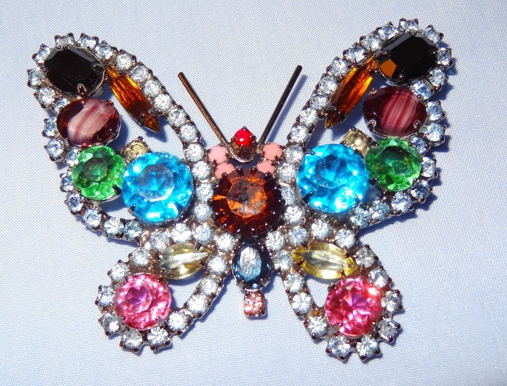 Kenneth Jay Lane's Large Multi-Color Rhinestone Butterfly Pin/Brooch trimmed in light blue Kenneth Jay Lane's Large Multi-Color Rhinestone Butterfly Pin/Brooch trimmed in light blue