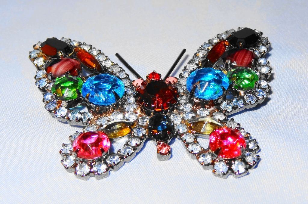 Kenneth Jay Lane's Large Multi-Color Rhinestone Butterfly Pin/Brooch trimmed in light blue Kenneth Jay Lane's Large Multi-Color Rhinestone Butterfly Pin/Brooch trimmed in light blue