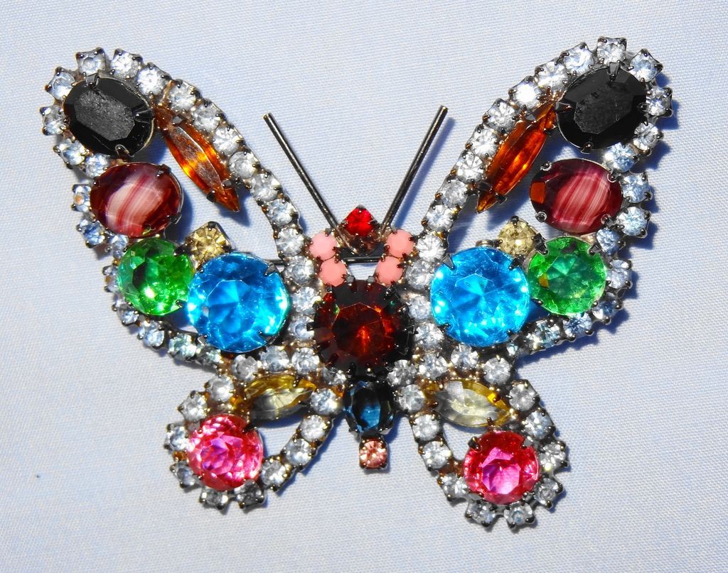 Kenneth Jay Lane's Large Multi-Color Rhinestone Butterfly Pin/Brooch trimmed in light blue Kenneth Jay Lane's Large Multi-Color Rhinestone Butterfly Pin/Brooch trimmed in light blue