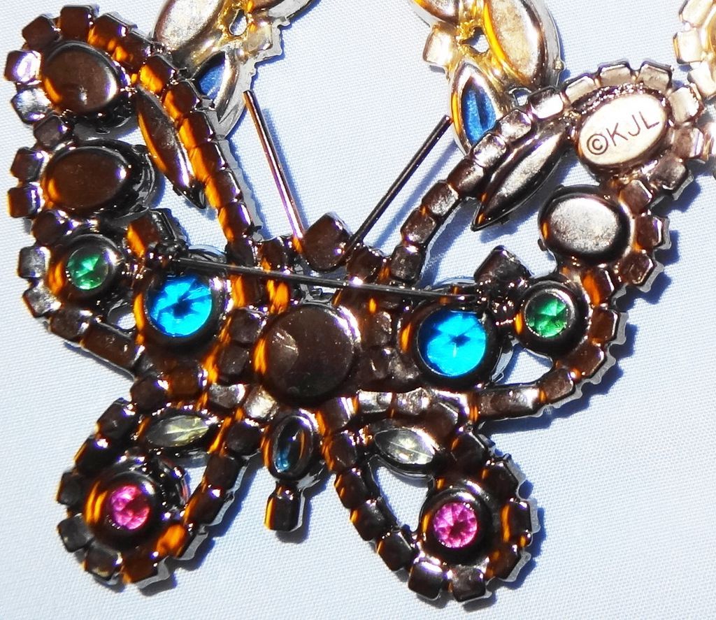 Kenneth Jay Lane's Large Multi-Color Rhinestone Butterfly Pin/Brooch trimmed in light blue Kenneth Jay Lane's Large Multi-Color Rhinestone Butterfly Pin/Brooch trimmed in light blue