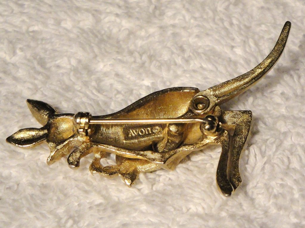 Avon Vintage Goldtone "Kangaroo" with moveable Joey & both have topaz eyes Avon Vintage Goldtone "Kangaroo" with moveable Joey & both have topaz eyes