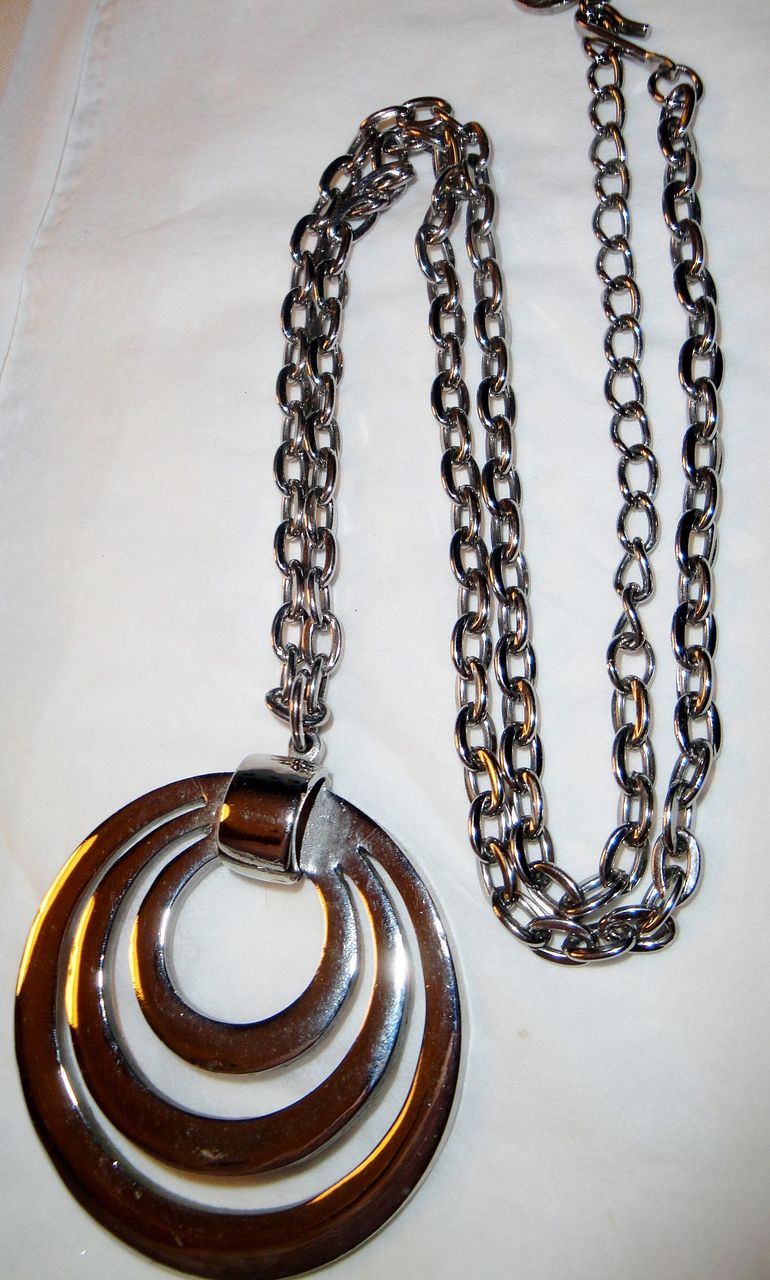 Vintage Signed Lisner "3 Orbits Circles You" in Silver-tone Pendant Necklace Vintage Signed Lisner "3 Orbits Circles You" in Silver-tone Pendant Necklace