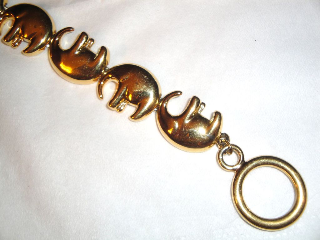 Vintage Signed Liz Claiborne Gold-tone 7 Elephant Motif Links Bracelet with Toggle Clasp Vintage Signed Liz Claiborne Gold-tone 7 Elephant Motif Links Bracelet with Toggle Clasp