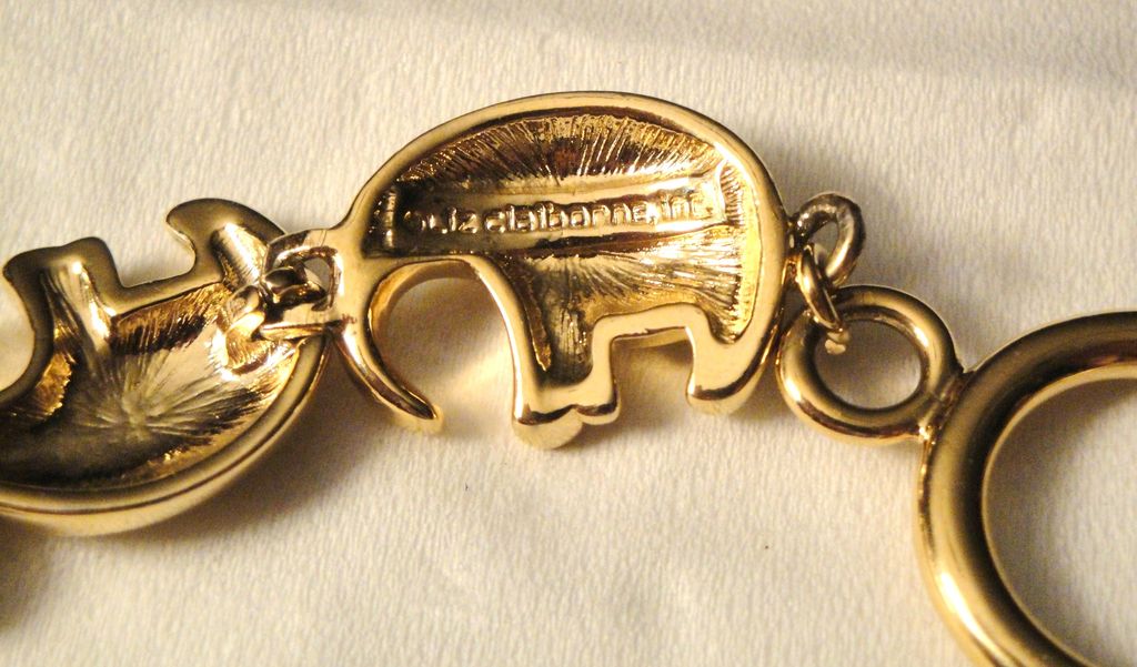Vintage Signed Liz Claiborne Gold-tone 7 Elephant Motif Links Bracelet with Toggle Clasp Vintage Signed Liz Claiborne Gold-tone 7 Elephant Motif Links Bracelet with Toggle Clasp